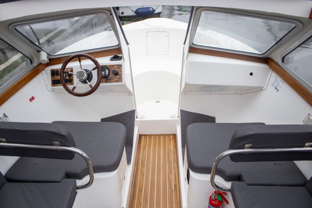 8 seater electric day boat view of cockpit and seating area